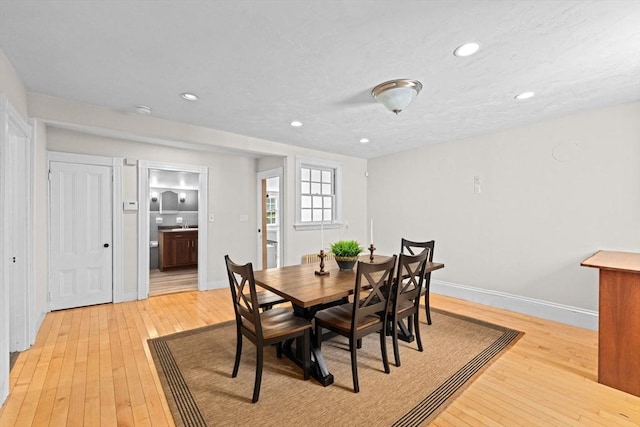 553 Center St, Hanover, MA 02339 - dining room with light wood-style flooring and recessed lighting