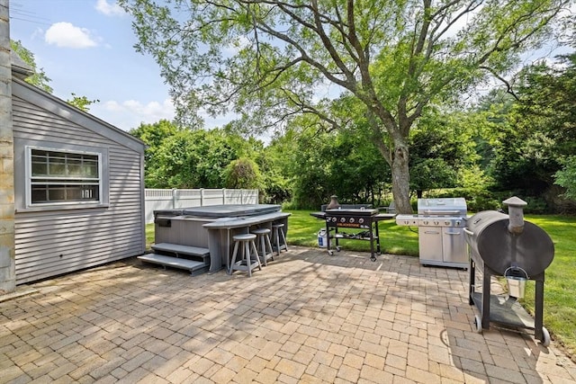 553 Center St, Hanover, MA 02339 - view of patio with a hot tub, area for grilling, and view of scattered trees