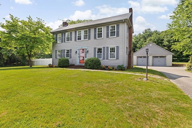 553 Center St, Hanover, MA 02339 - colonial house with a chimney, a detached garage, and an outbuilding