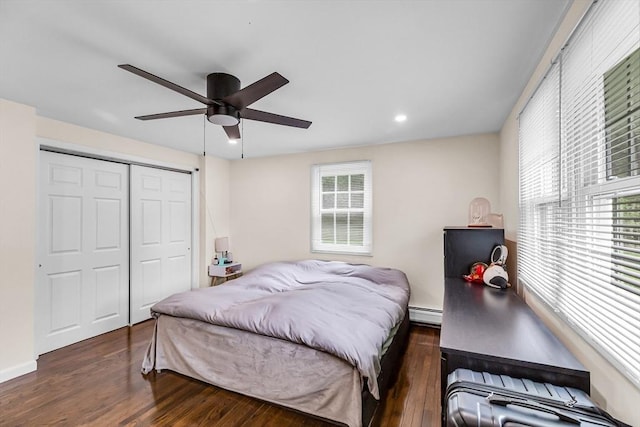 3 Bayberry Ln, Westfield, MA 01085 - bedroom with wood finished floors, multiple windows, a closet, baseboard heating, and recessed lighting