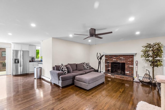 3 Bayberry Ln, Westfield, MA 01085 - living room with dark wood-type flooring, ceiling fan, a baseboard heating unit, recessed lighting, and a fireplace