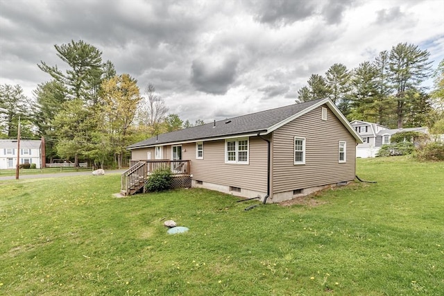 3 Bayberry Ln, Westfield, MA 01085 - rear view of house featuring a wooden deck, a yard, and roof with shingles