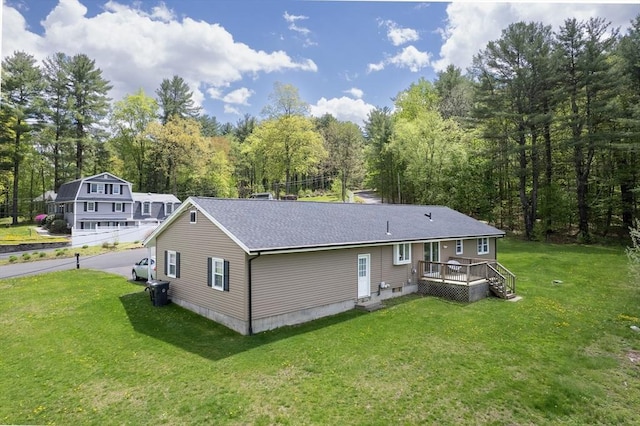 3 Bayberry Ln, Westfield, MA 01085 - rear view of house with a yard, a wooden deck, and a wooded view