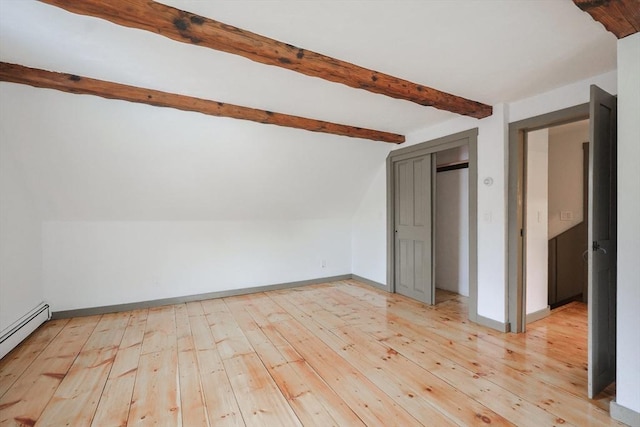649 S Main St, Raynham, MA 02767 - unfurnished room with beam ceiling, light wood-style floors, a baseboard heating unit, and baseboards