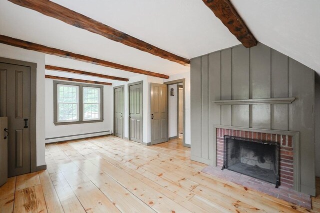 649 S Main St, Raynham, MA 02767 - unfurnished living room featuring a baseboard radiator, beamed ceiling, light wood-style floors, and a brick fireplace
