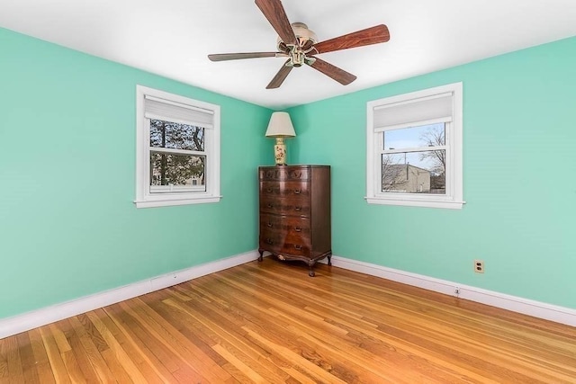 unfurnished bedroom featuring ceiling fan and light hardwood / wood-style flooring