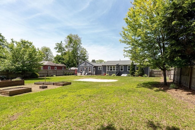 59 Kulig St, Springfield, MA 01104 - view of yard featuring a vegetable garden
