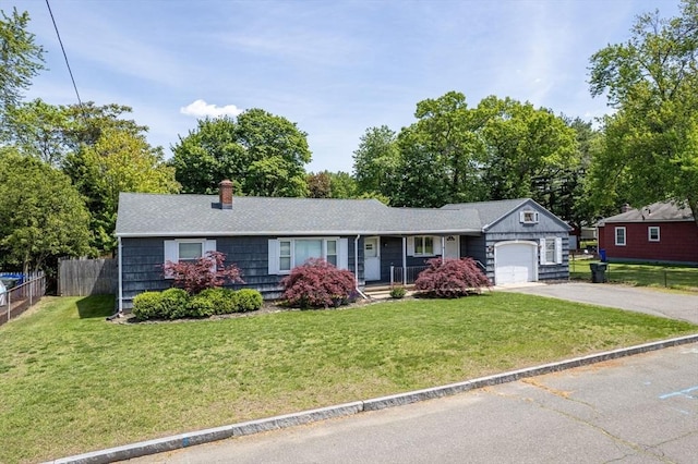 59 Kulig St, Springfield, MA 01104 - single story home with a garage, a porch, a chimney, asphalt driveway, and roof with shingles