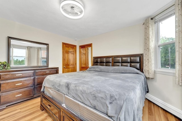 131 Beacon St Unit 4, Chelsea, MA 02150 - bedroom with light wood-type flooring and baseboards