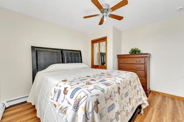 131 Beacon St Unit 4, Chelsea, MA 02150 - bedroom featuring light wood-style flooring, baseboards, a baseboard heating unit, a ceiling fan, and a baseboard radiator