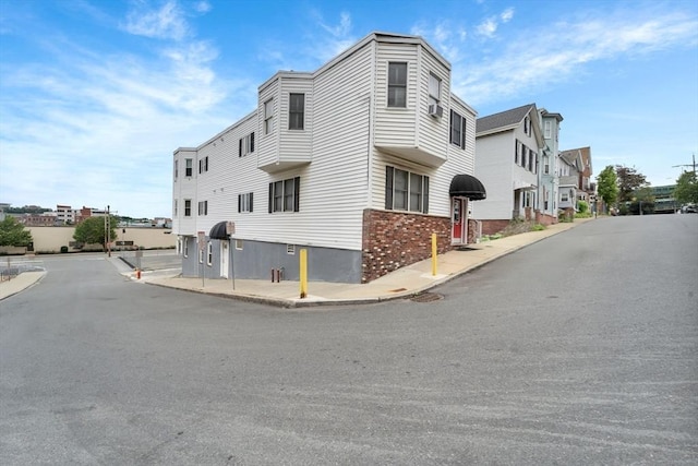 131 Beacon St Unit 4, Chelsea, MA 02150 - view of building exterior with a residential view