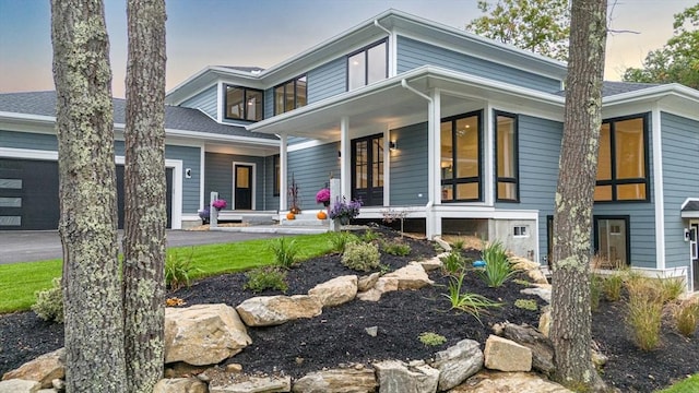 modern home with covered porch