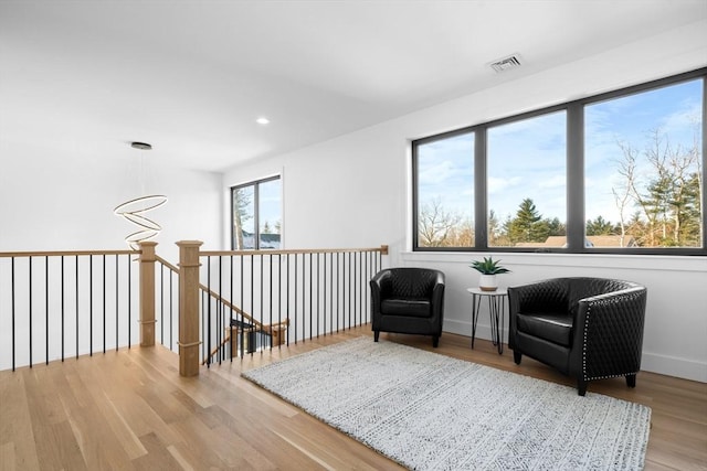 living area featuring light hardwood / wood-style floors