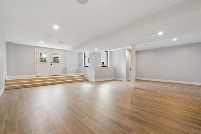 interior space featuring french doors and light wood-type flooring