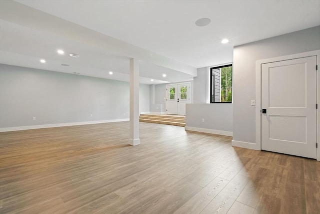 basement with light wood-type flooring