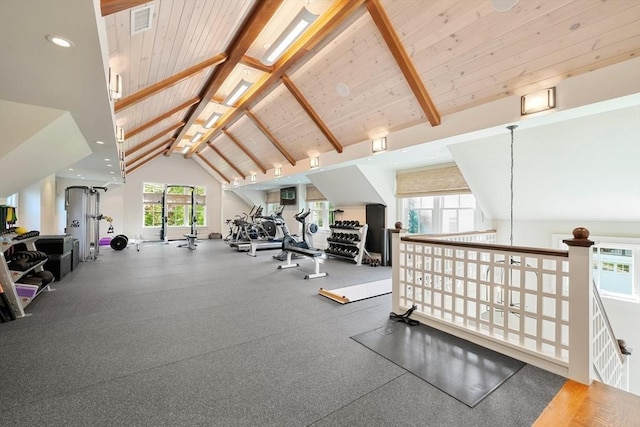 exercise room featuring visible vents, wooden ceiling, and high vaulted ceiling