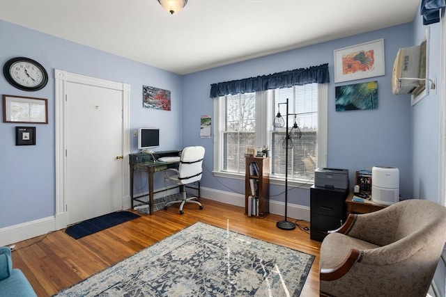 113 Belmont St, Belmont, MA 02478 - home office featuring baseboards and wood finished floors