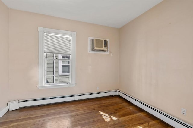 113 Belmont St, Belmont, MA 02478 - unfurnished room featuring a wall mounted AC, wood finished floors, and a baseboard radiator