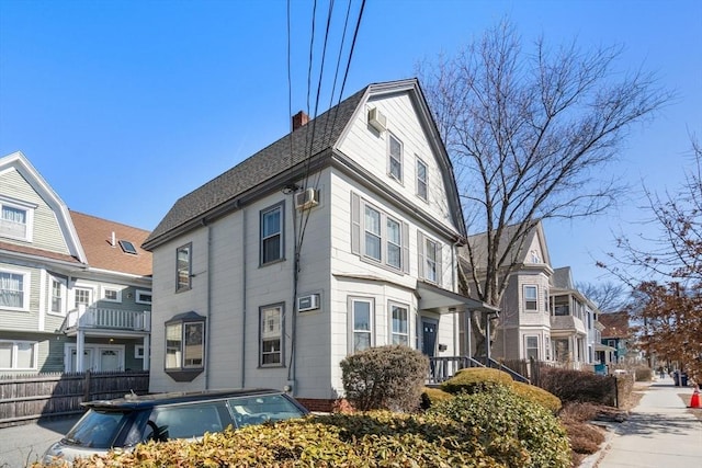 113 Belmont St, Belmont, MA 02478 - view of home's exterior with a chimney