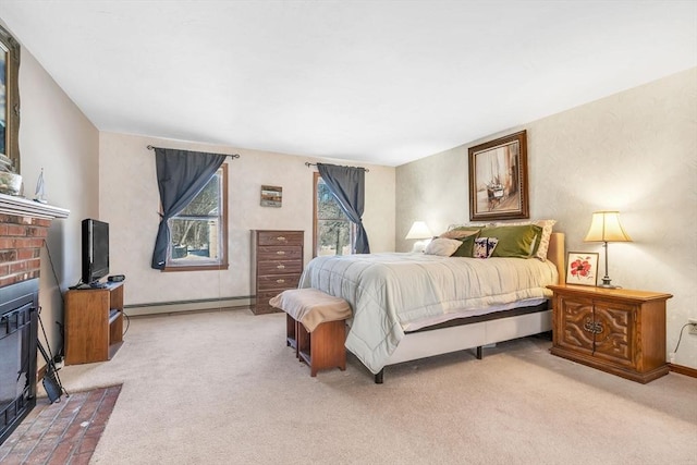 bedroom featuring a baseboard radiator, a brick fireplace, and light colored carpet