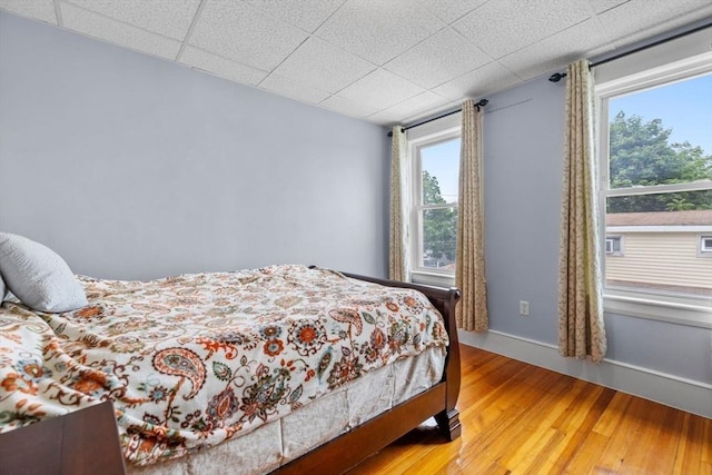 24-26 Lincoln St, North Andover, MA 01845 - bedroom with multiple windows, wood-type flooring, and a paneled ceiling