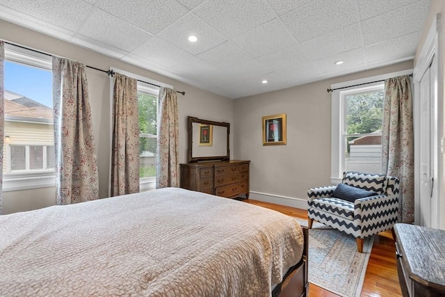 24-26 Lincoln St, North Andover, MA 01845 - bedroom featuring multiple windows, wood finished floors, and recessed lighting
