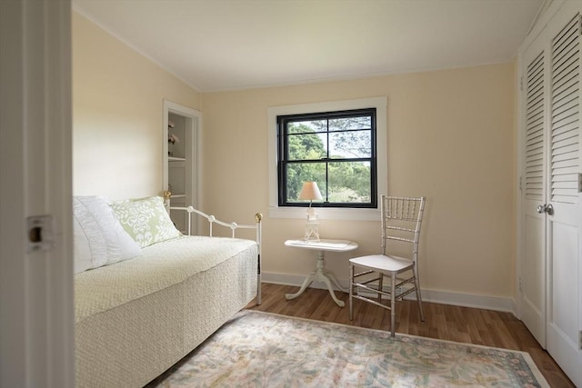 bedroom featuring hardwood / wood-style floors