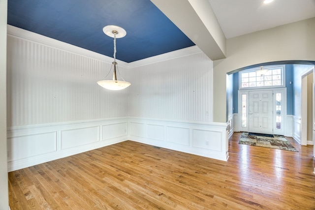 foyer entrance featuring hardwood / wood-style floors