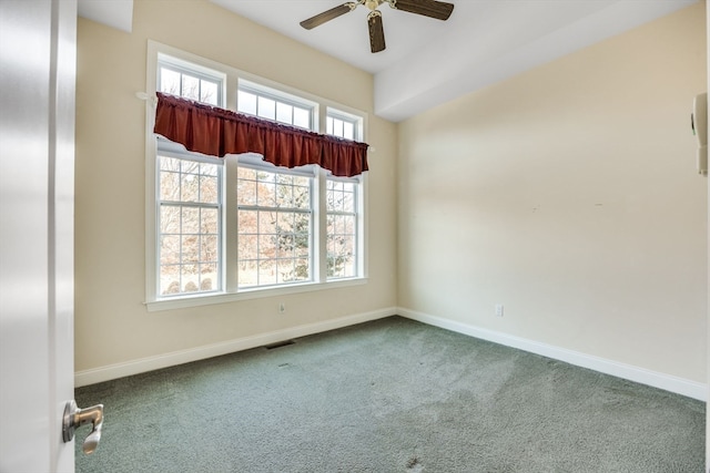 carpeted empty room with ceiling fan