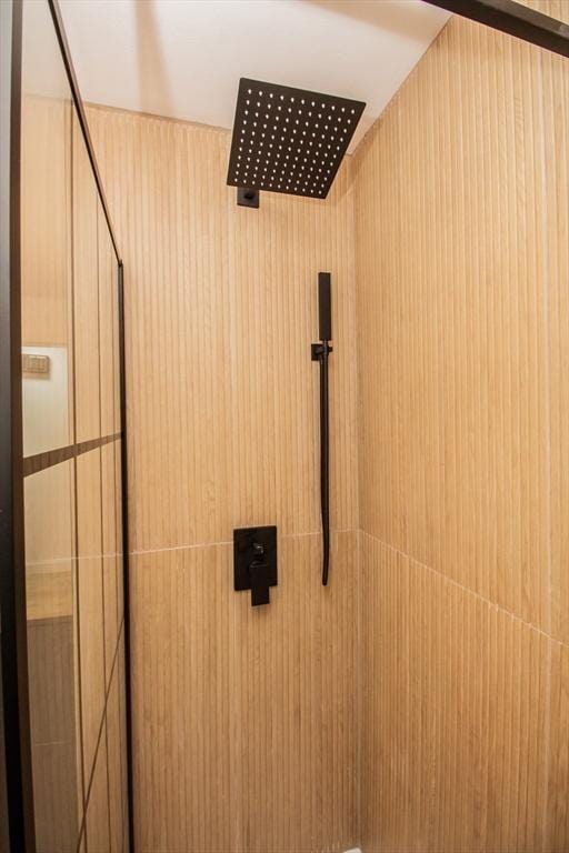 details with tiled shower and elevator