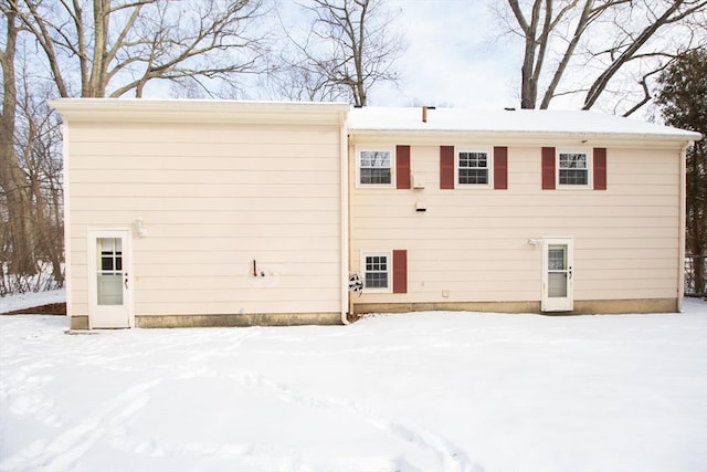 view of snow covered property