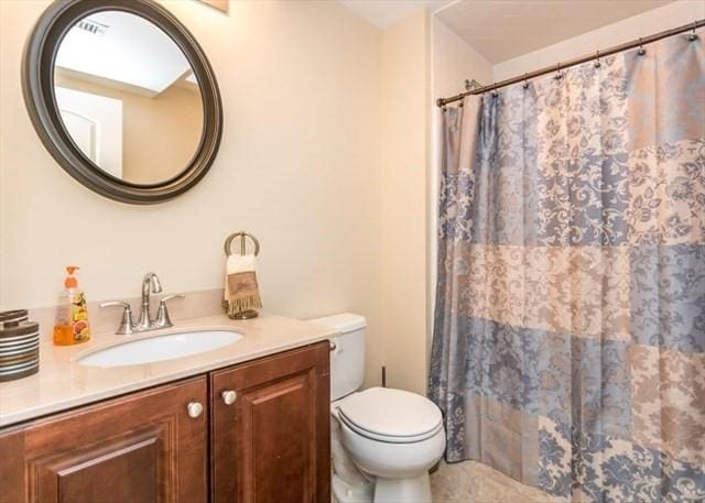 255 Winter St Unit 305, Waltham, MA 02451 - full bathroom with vanity, curtained shower, and tile patterned floors