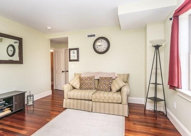 255 Winter St Unit 305, Waltham, MA 02451 - living area featuring wood finished floors