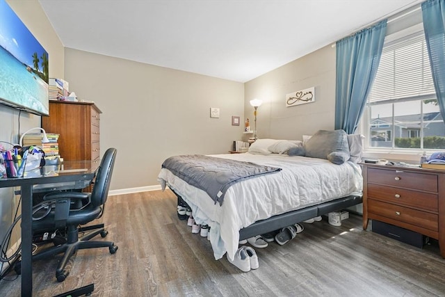 1249-1251 Rockdale Ave, New Bedford, MA 02740 - bedroom featuring wood finished floors, a desk, and baseboards