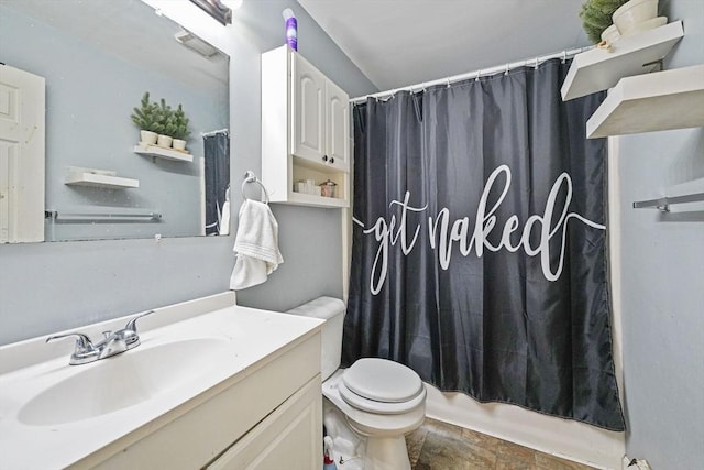 1249-1251 Rockdale Ave, New Bedford, MA 02740 - full bath featuring vanity, toilet, shower / bath combo, and stone finish flooring