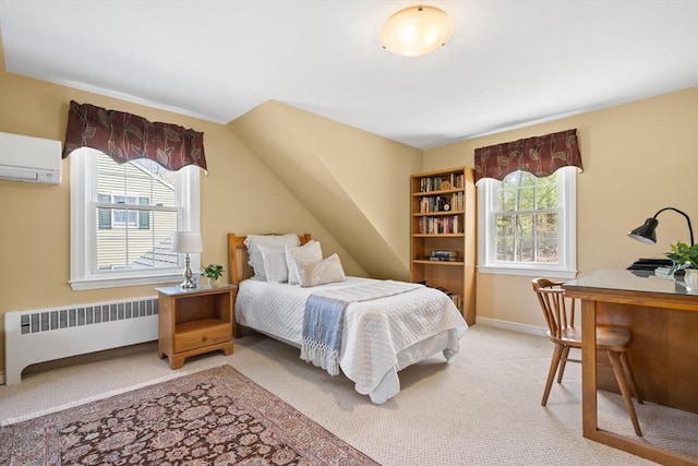 bedroom with radiator heating unit, multiple windows, and light colored carpet