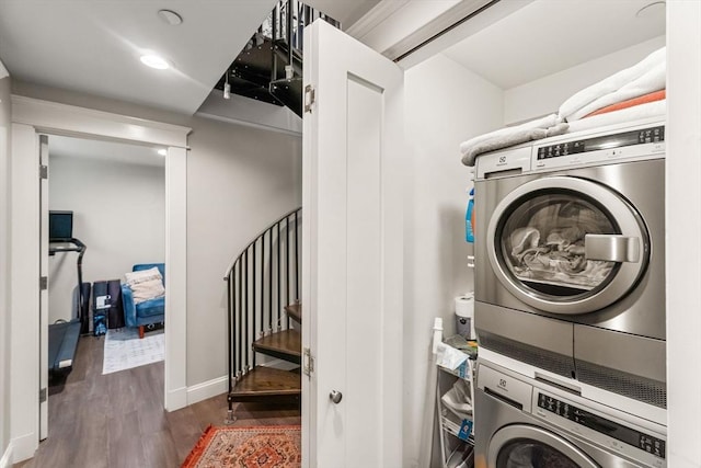 23 Dix St Unit 1, Boston, MA 02122 - laundry room with stacked washer and clothes dryer, wood finished floors, baseboards, and recessed lighting