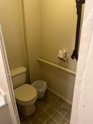 bathroom featuring toilet and tile patterned floors