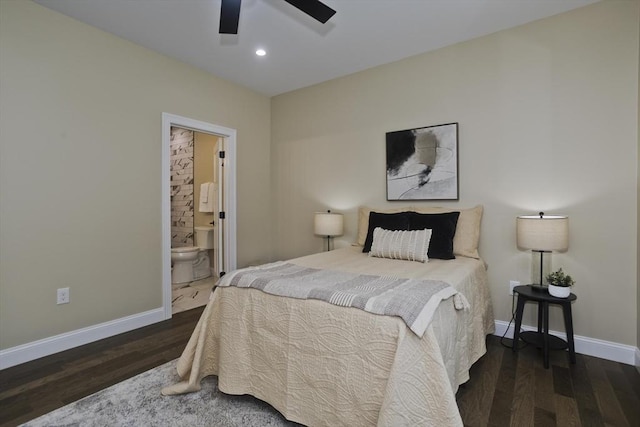 bedroom with ceiling fan, dark hardwood / wood-style flooring, and ensuite bath