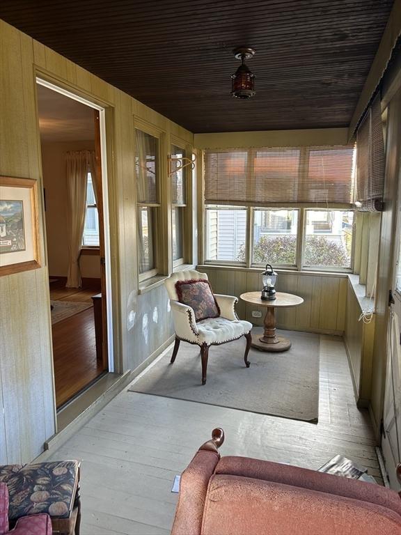 sunroom with wood ceiling