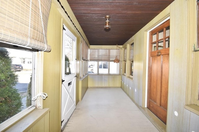 hallway featuring wooden ceiling