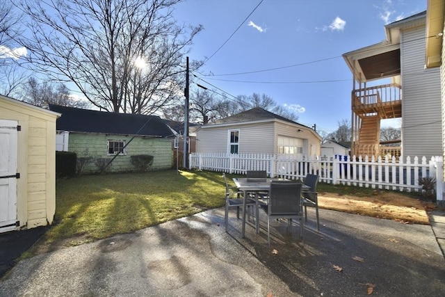 view of patio with a storage unit