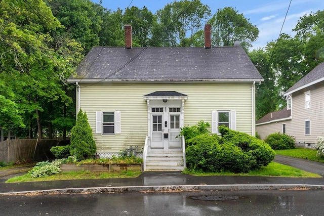 19-21 Pleasant St, North Andover, MA 01845 - view of front facade featuring a chimney and entry steps