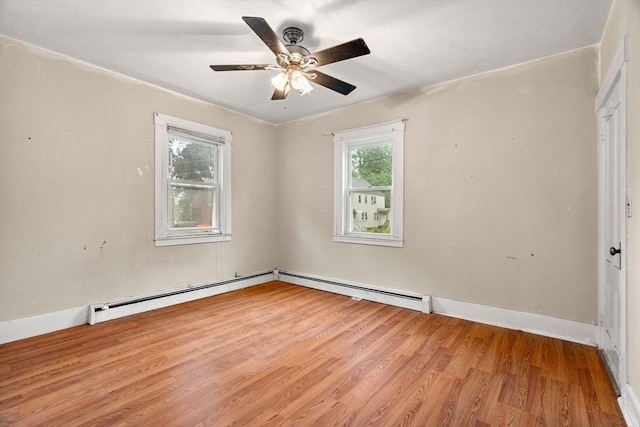 19-21 Pleasant St, North Andover, MA 01845 - empty room with wood finished floors, ceiling fan, and baseboards