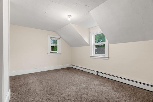19-21 Pleasant St, North Andover, MA 01845 - bonus room featuring a baseboard heating unit, carpet flooring, vaulted ceiling, and baseboards