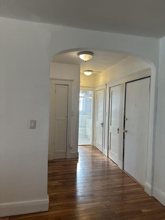 hall featuring dark hardwood / wood-style flooring