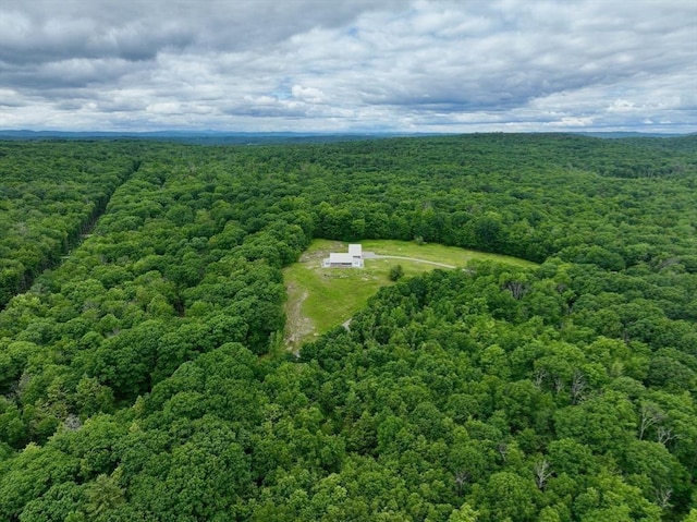 aerial view featuring a view of trees