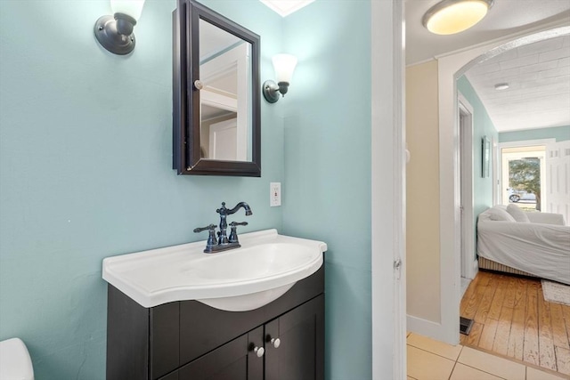 bathroom with tile patterned flooring and vanity