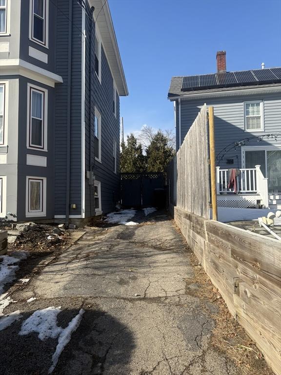 view of home's exterior with solar panels