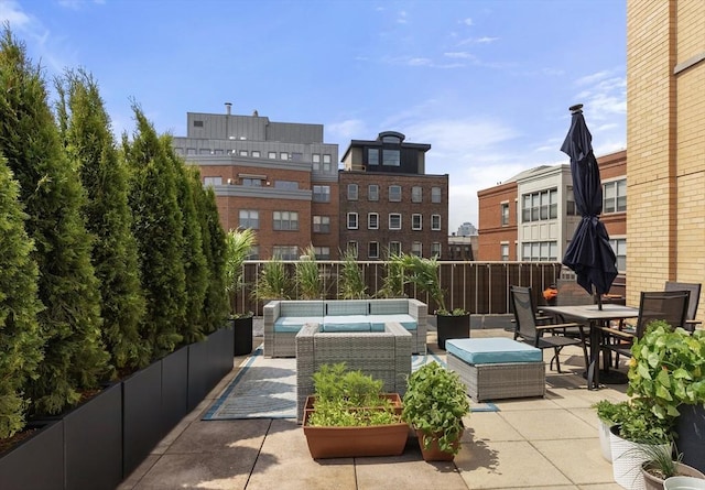35 Fay St Unit 411, Boston, MA 02118 - view of patio featuring an outdoor living space